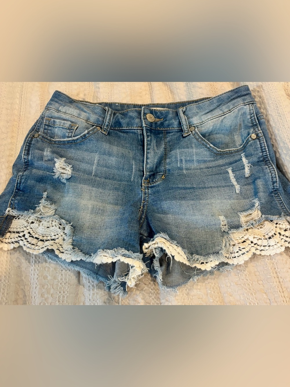 the cutest Light Blue Distressed Denim Shorts with Crochet Trim
